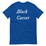 Royal blue unisex t-shirt with "Black Caesar" written in White, on two horizontal lines across the front. Black Caesar (died 1718) was a legendary 18th-century African pirate. The legends say that for nearly a decade, he raided shipping from the Florida Keys and later served as one of Captain Blackbeard's, a.k.a. Edward Teach's, crewmen aboard the Queen Anne's Revenge