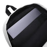 White Minimalist Backpack with Black unisex hoodie depicting white Mutineer Bay trademarked logo on the front.