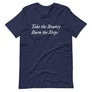 Purple unisex t-shirt with wording "Take The Bounty, Burn the Ships" written on two horizontal rows in IM Fell font on the front. Lettering is in White.