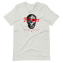 Oatmeal short sleeve t-shirt with "Pirates Honor Loyalty" written horizontally transposed over skull outline. Lettering is in red and skull is in black.