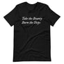 Black unisex t-shirt with wording "Take The Bounty, Burn the Ships" written on two horizontal rows in IM Fell font on the front. Lettering is in White.