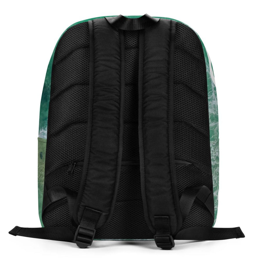 Minimalist Backpack with all over image of shore line in Tortuga with word "Pirates" written in center in white IM Fell font.