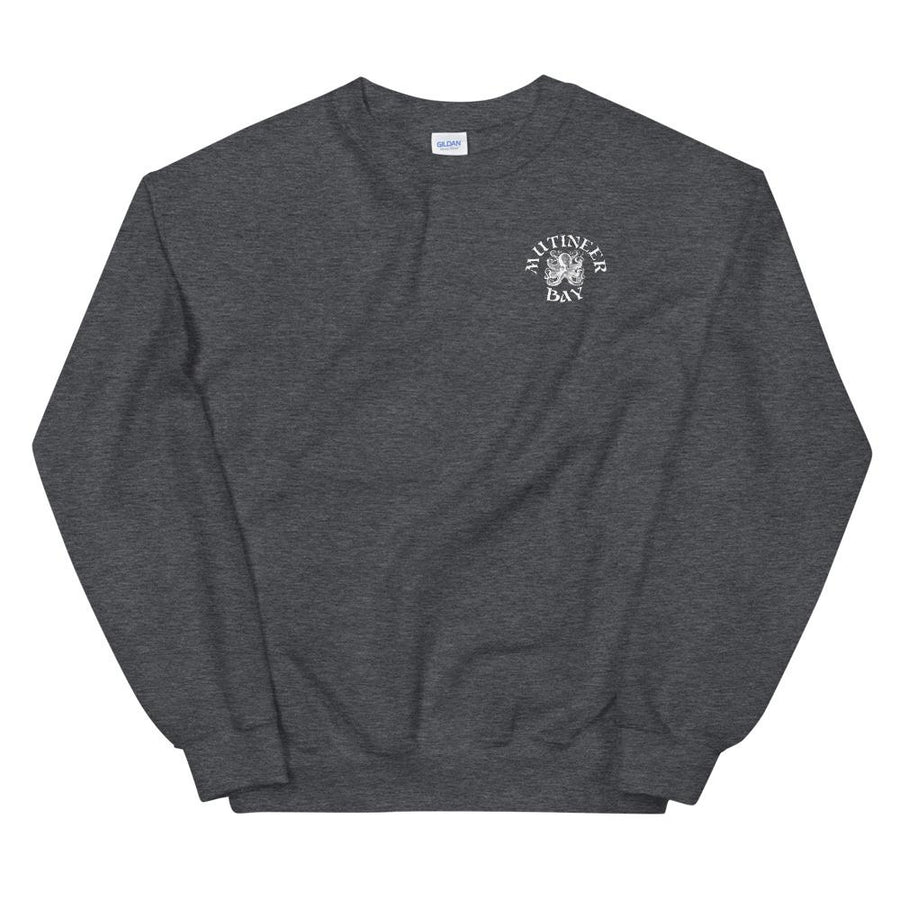 Grey unisex sweatshirt wit white "Mutineer Bay" logo on front left breast. On the back is Mutineer Bay slogan "Never Be Tamed." written on three horizontal lines in white IM Fell font